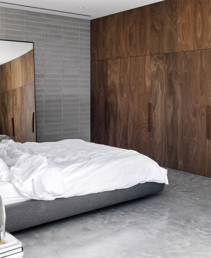 natural-materials-bricks-modern-mans-bedroom.jpg