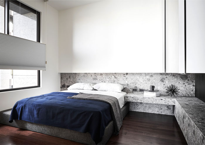 natural-materials-marble-modern-mans-bedroom.jpg