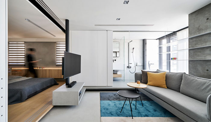 rotating-flat-screens-modern-mans-bedroom.jpg