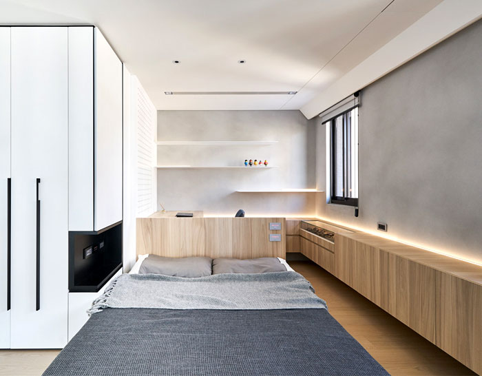 rotating-flat-screens-modern-mans-bedroom-1.jpg